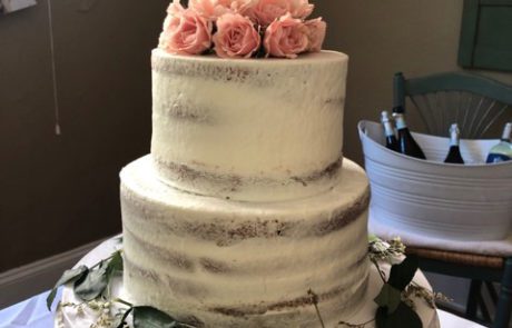 Pink Rose topped Wedding Cake